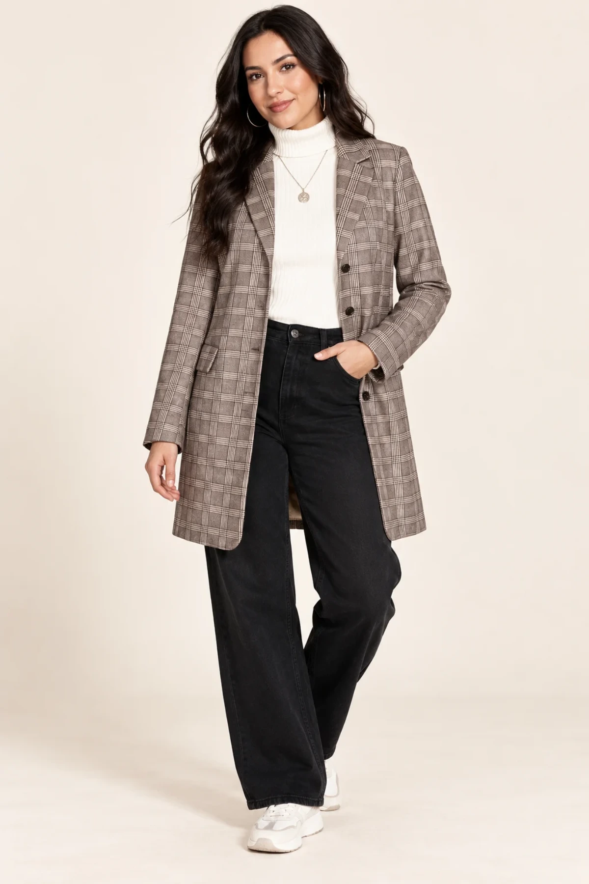 Model in a checked longline jacket